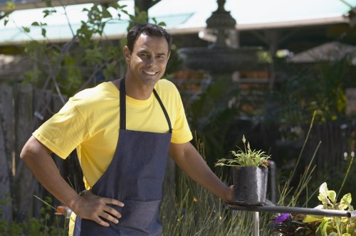 Professional landscapers working on a garden design in Muswell Hill